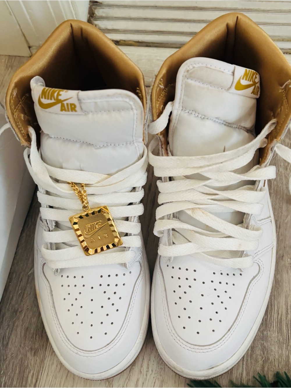 Women's Air Jordan 1 Retro High OG "Metallic Gold". Released on February 14,